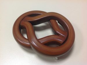 fibbia cuoio marrone intreccio